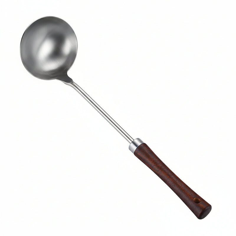 Serving spoon with a wooden handle on a white background